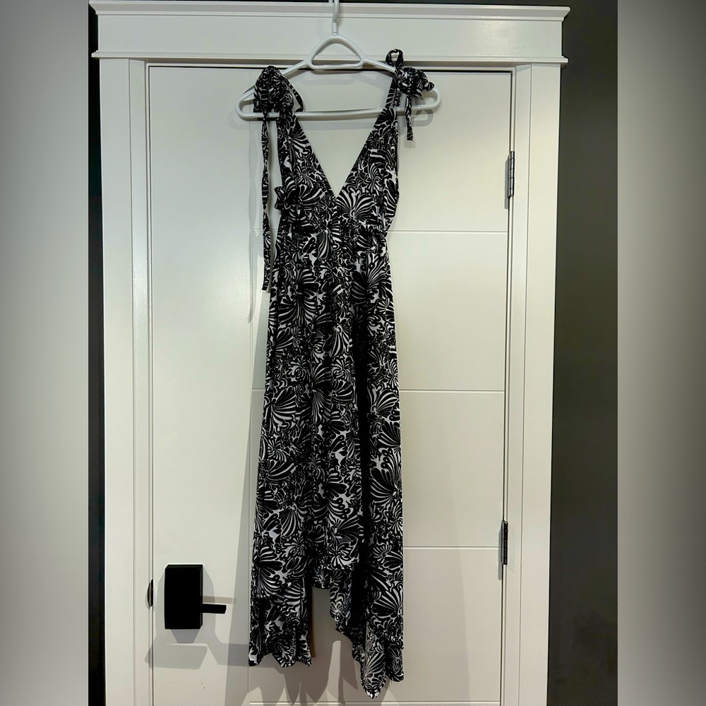 NWOT. Backless style of dress.